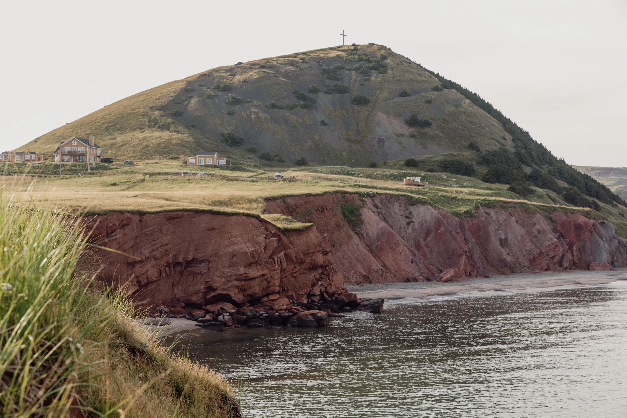 Peaceful coastal landscape with calm ocean and sandy beach